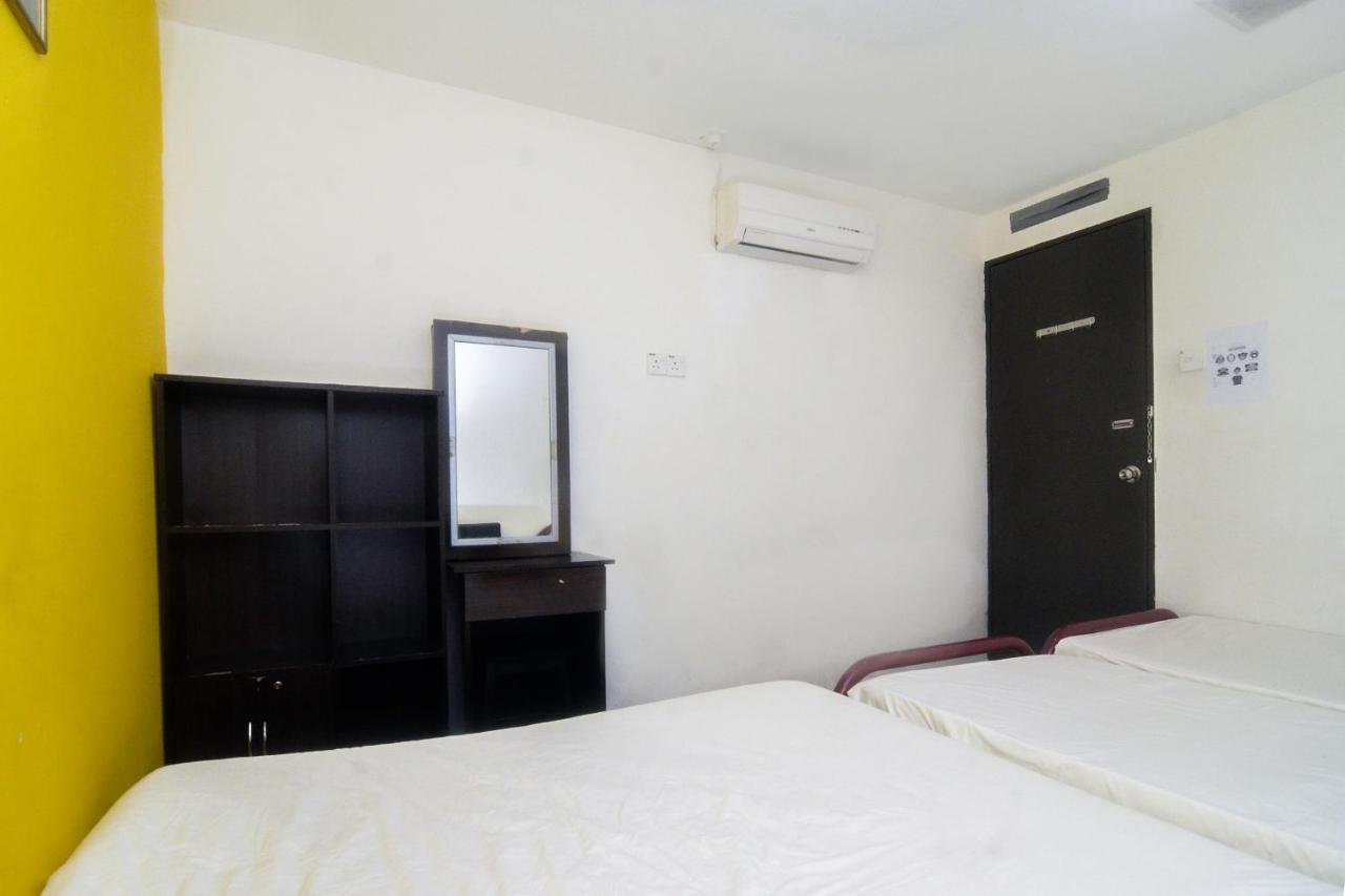 Spot On 89886 Backpacker'S Stay Services Kuching Luaran gambar